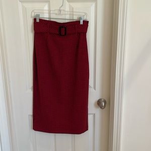 Zara mid skirt with zipper, belt and buttons in the back .